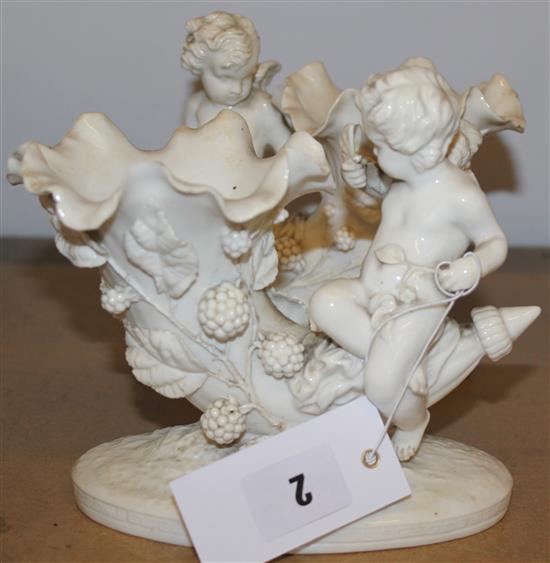 Pair of Moore Bros. cherub cornucopia vases